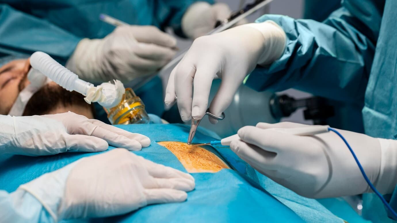 doctors-doing-surgical-procedure-patient_23-2148962499.jpg