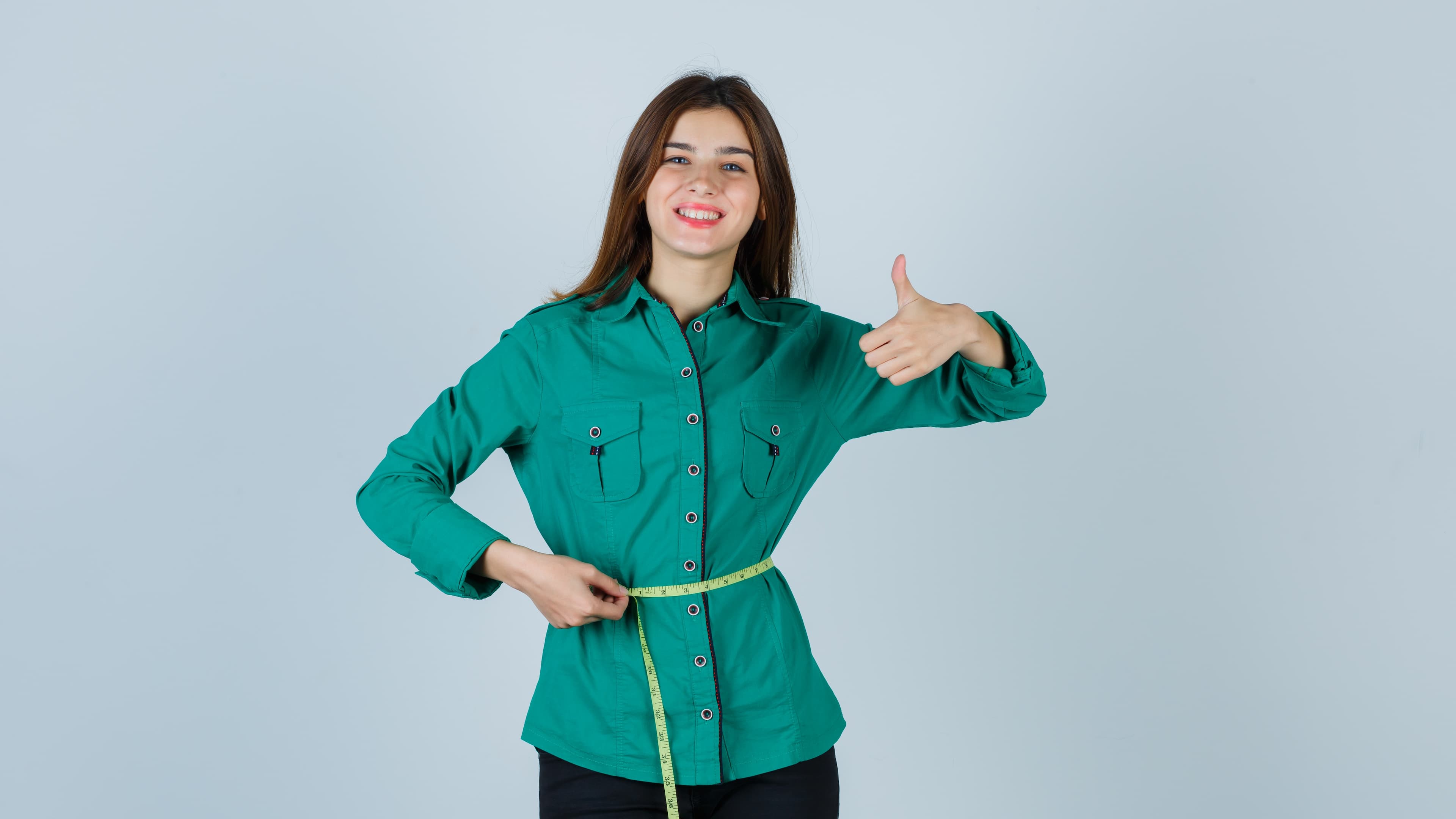 expressive-young-woman-posing-studio.jpg